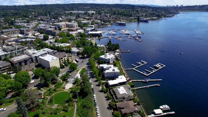 Aerial view of Kirkland, WA waterfront showing marinas and residential areas, highlighting the serene and upscale living environment.