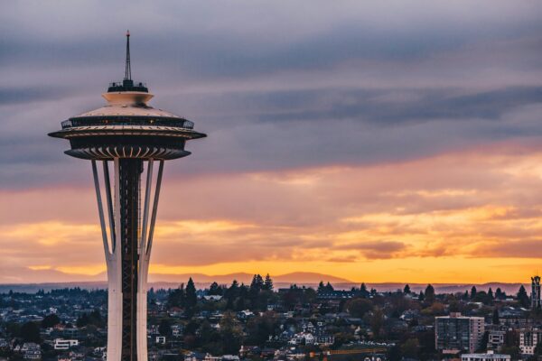 Panoramic view of Seattle skyline highlighting prominent landmarks like the Space Needle, representing the dynamic Seattle real estate market.